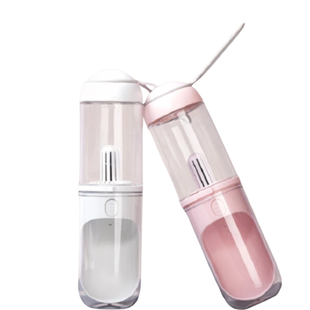 Dog drinking from travel pet water bottle with U-shaped trough