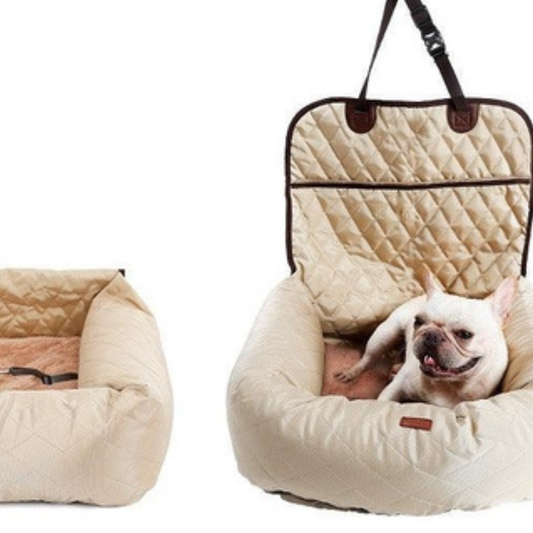 Dog lying in soft padded pet travel bed